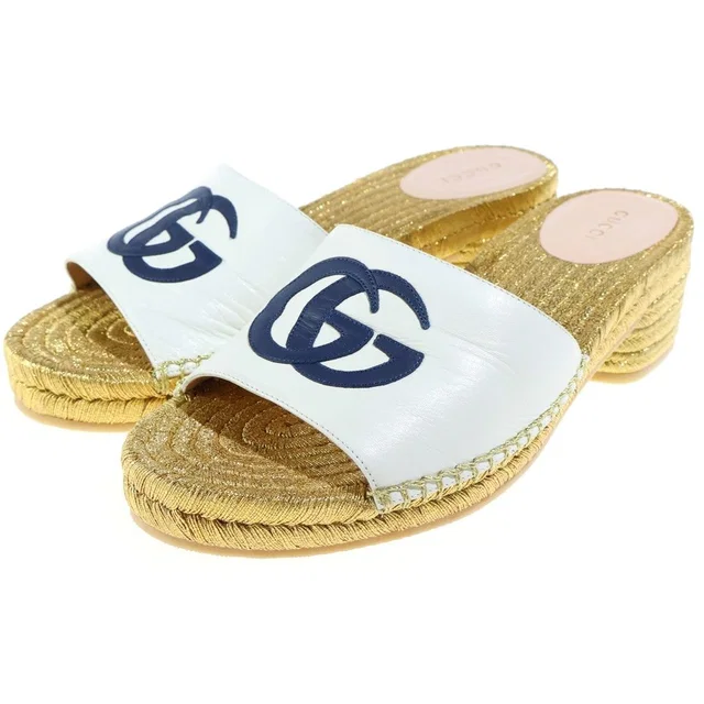 Gucci Interlocking G Sandals Gold in Gold from The Reluxe
