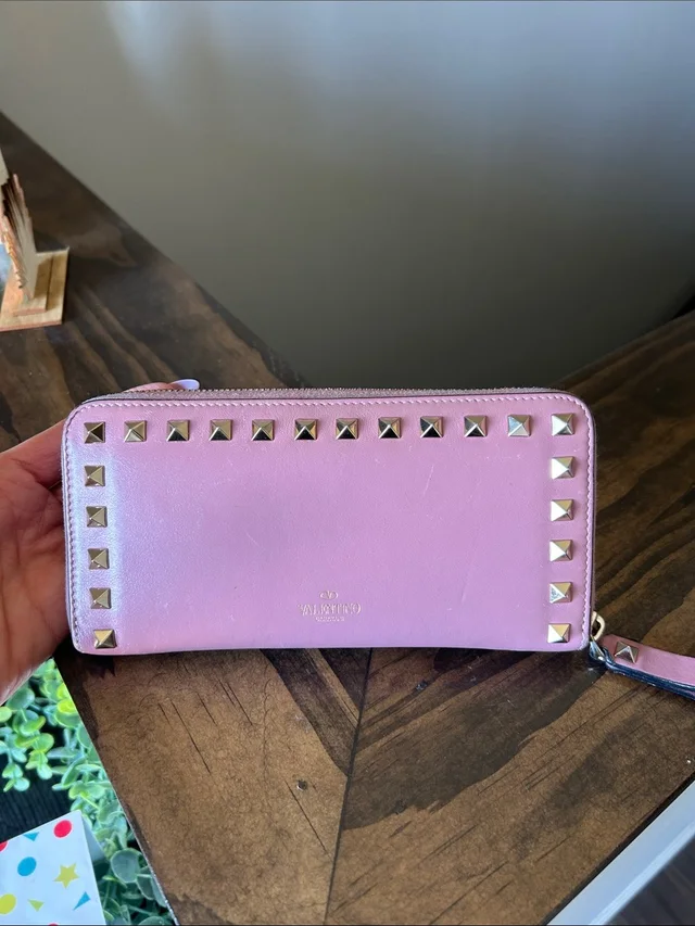 464. Valentino Garavani Pink Zip-Around Rockstud Wallet With Gold Studs in pink Calfskin from Poshmark