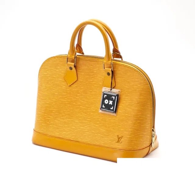 Louis Vuitton Alma Epi Leather Yellow Handbag in Yellow Leather from The Reluxe
