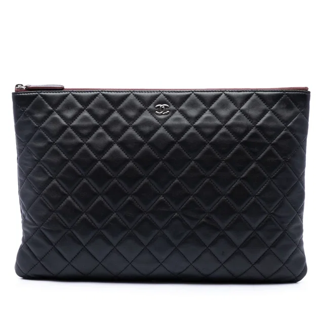 Black Chanel Large Quilted Lambskin O Case Clutch in Black Lambskin from Designer Revival