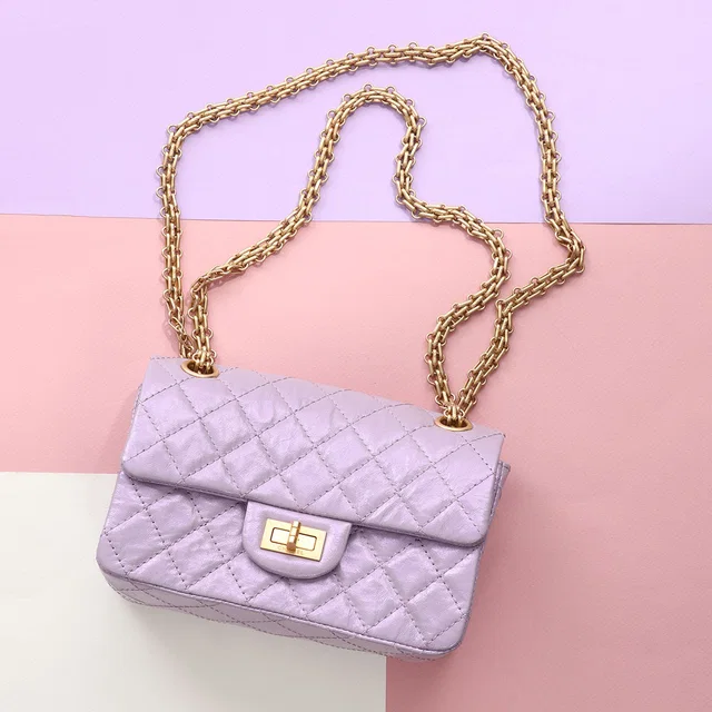 Chanel Mini Glittered Lilac Quilted Aged Calfskin Reissue in Purple Calfskin from Ann's Fabulous Finds