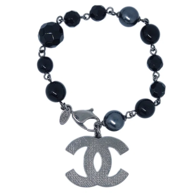 Chanel Bracelet Costume Pearl Black A13V in Black Resin from AMORE Vintage Tokyo