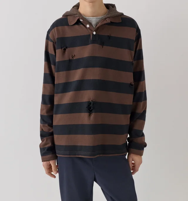 Gimaguas Striped polo shirt in Cotton 100% Description: The polo collar and button placket evoke a collegiate vibe, while scattered distressed details amidst the stripes reveal a…, photo 2 of 4 from SENSER