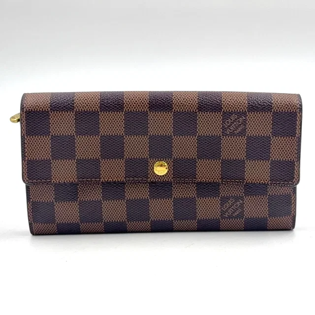 Louis Vuitton Portefeuille Sarah Damier Ebene Leather Brown Bifold Wallet Gold in Brown Leather from The Reluxe