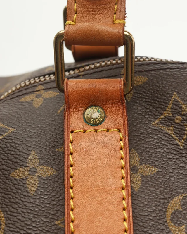 Louis Vuitton Monogram Keepall Bandoulière 60 Weekend Bag in Coated canvas from A Retro Tale, photo 7 of 12