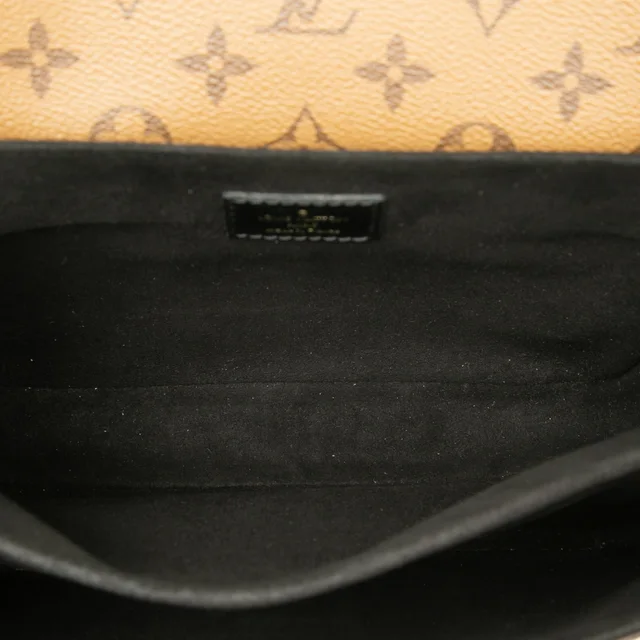 Brown Louis Vuitton Monogram Reverse Pochette Metis Satchel in Brown Coated canvas from Designer Revival, photo 2 of 2