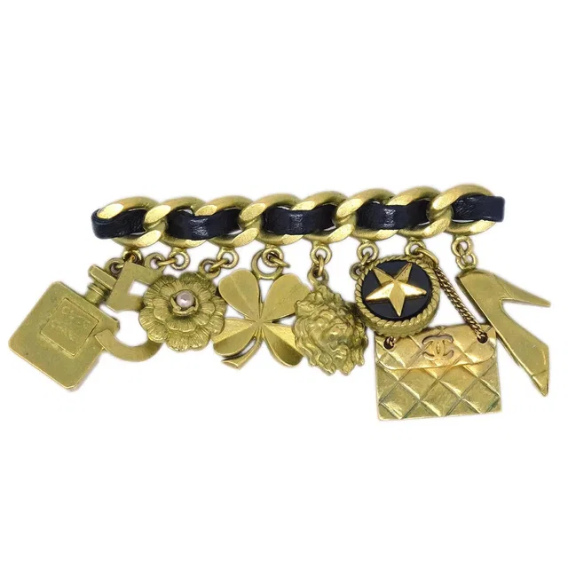 Chanel Icon Brooch Pin Gold 95P in Gold Leather from AMORE Vintage Tokyo