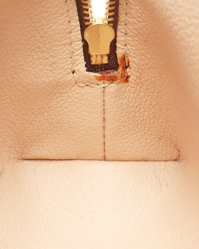 Louis Vuitton Monogram Cosmetic Pouch in Coated canvas from A Retro Tale, photo 9 of 9