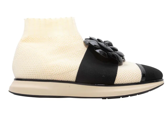 White & Black Chanel Camellia Cap-Toe Sock Sneakers Size 39 in Black from Designer Revival