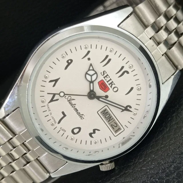 Vintage 1983 Seiko Automatic Mens Silver Watch W/Daydate & Red Accents in gold|silver|gray from Poshmark