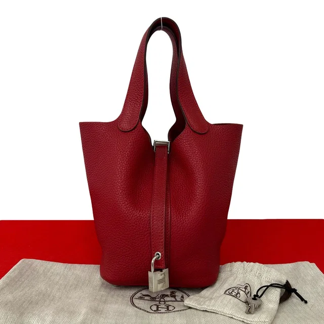 Hermès Picotin Lock PM Taurillon Clemence Handbag Rouge Casack with Bag in Red Clemence leather from The Reluxe