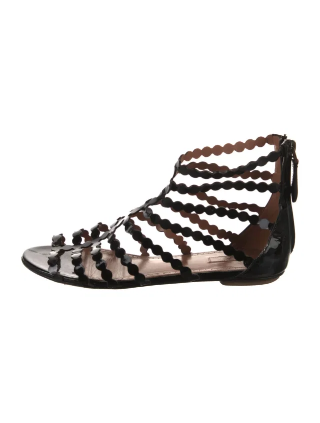 Alaïa Patent Leather Scalloped Accent Gladiator Sandals in black Patent leather from The RealReal