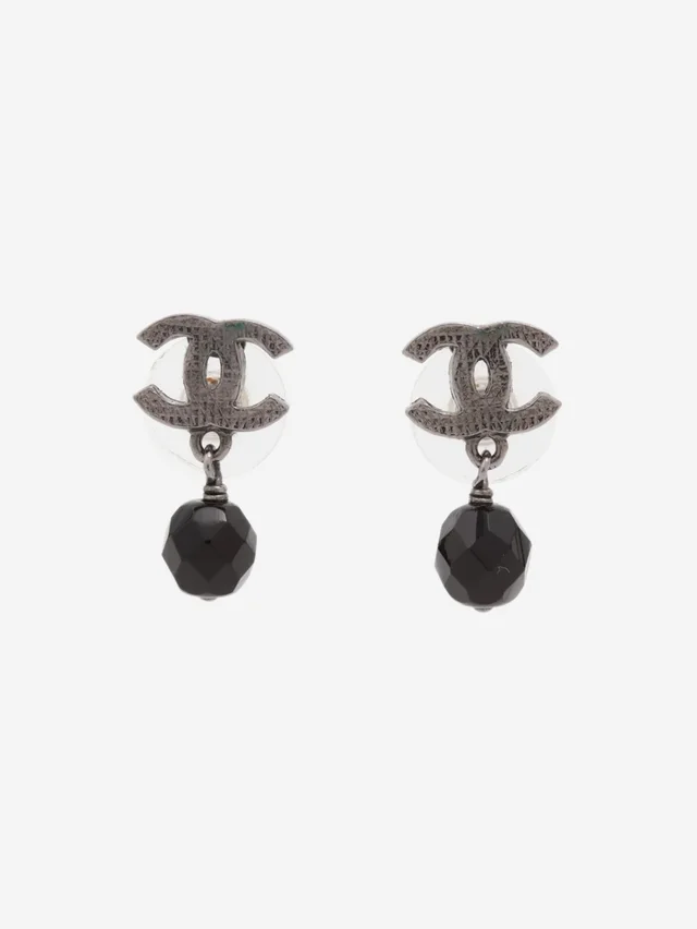 Chanel Silver Coco Mark 09P drop earrings in Silver from Sign of the Times