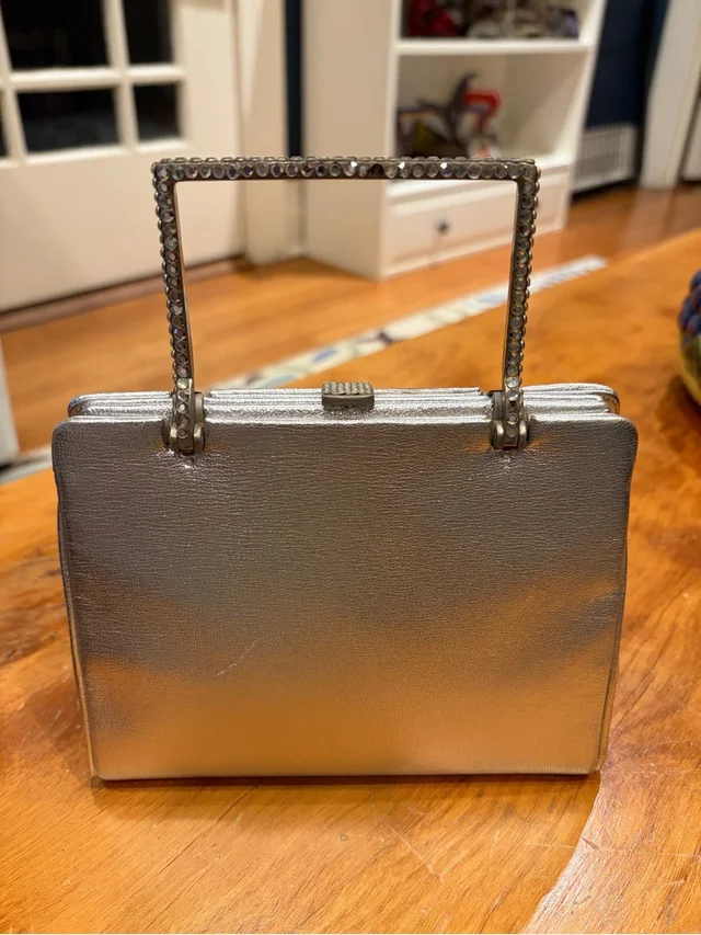 Judith Leiber Metallic Silver Rhinestone-Handle Top-Handle Clutch in silver|gray from Poshmark