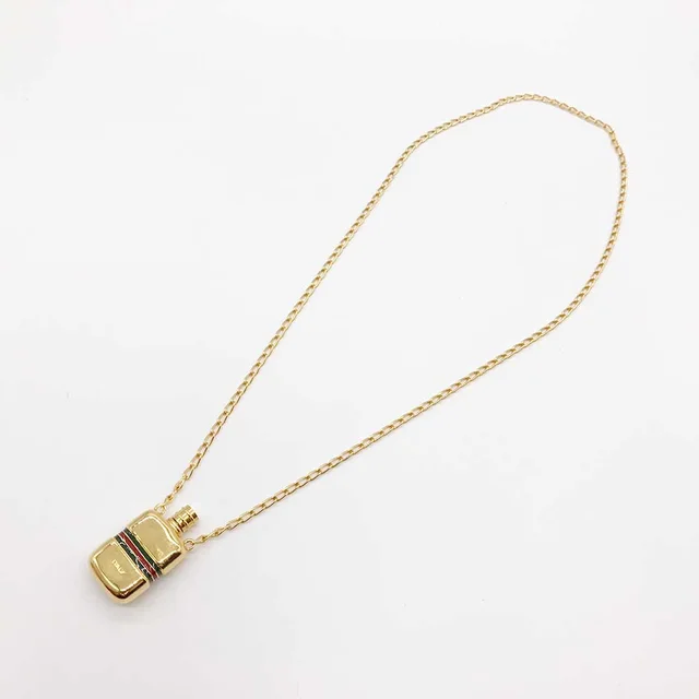 Gucci Metal Bottle Motif Necklace in Gold Others from LuxUness, photo 2 of 4