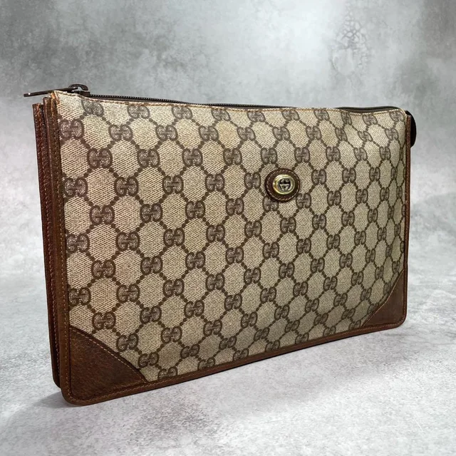 Gucci GG Clutch Brown Leather Logo Gold in Brown Leather from The Reluxe