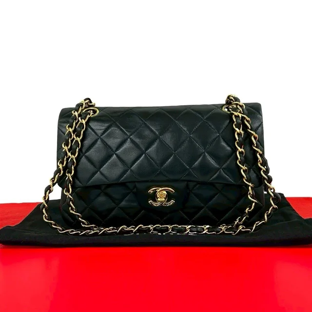 Chanel And No. 5 Vintage Quilted Double Flap Lambskin Leather Shoulder Bag Black in Black Lambskin from The Reluxe
