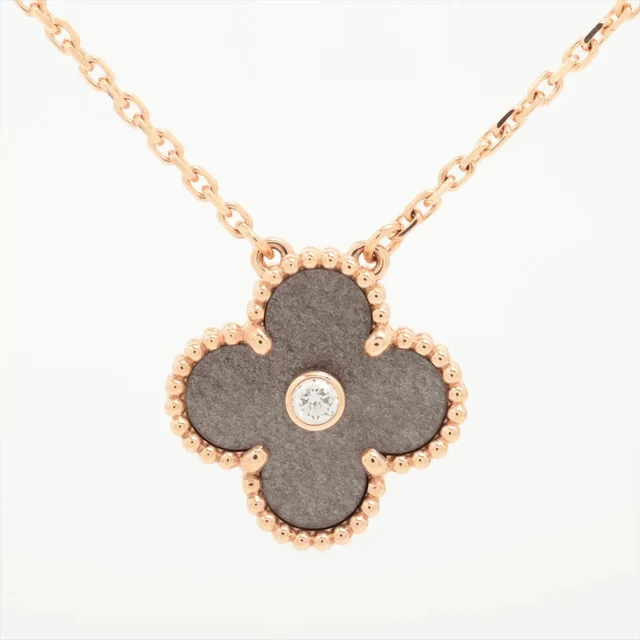 Van Cleef & Arpels Holiday Pendant Vintage Alhambra Obsidian Diamond Necklace 2023 from The Purse Affair