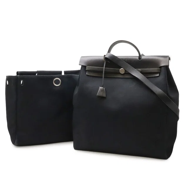 Hermès Herbag MM 2-Way Shoulder Bag Toile Officier Canvas Black in Black Canvas from The Reluxe