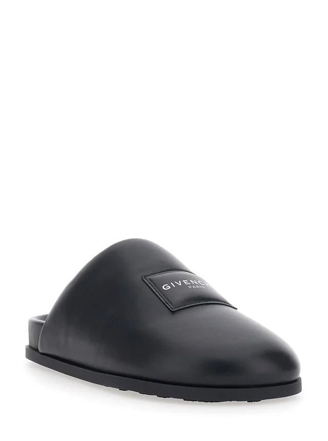 GIVENCHY Black Mules with Asymmetrical Design and Padded Leather Logo Women in Black 100% Lamb, photo 4 of 8 from Gaudenzi Boutique