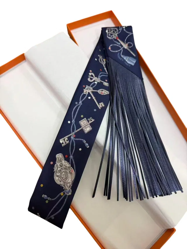 Hermès Navy Keys Twilly with Leather Fringe in Navy Leather from Luxury Promise