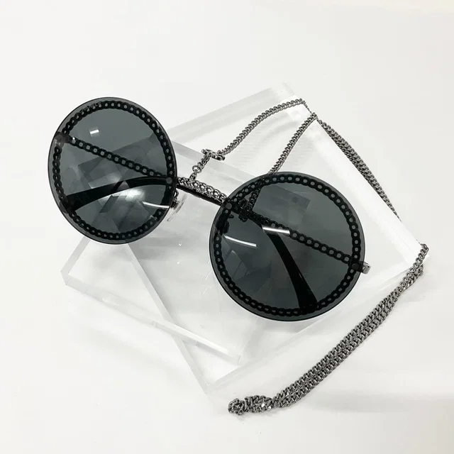 Chanel Sunglasses CC Logo Chain Eyewear Black in Black from The Reluxe