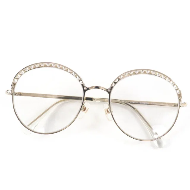 Chanel 4247 Coco Mark Fake Pearl Sunglasses Date from The Reluxe