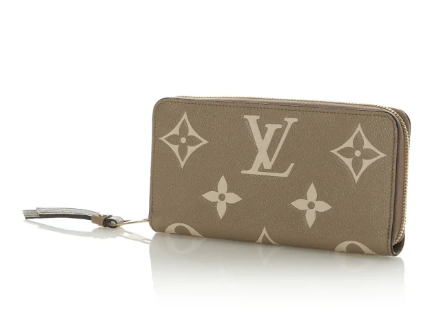 Louis Vuitton Dove and Cream Bicolor Monogram Empreinte Leather Zippy Wallet in White Leather from Ann's Fabulous Finds, photo 2 of 9