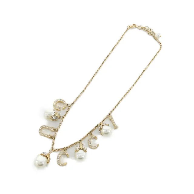 Gucci グッチ ネックレス in WHITE+CLEAR(ホワイト+クリア) / GOLD(ゴールド)金具 長さ: 39-44cm モチーフ 横x縦: 1.1cmx1.5cm from KOMEHYO, photo 2 of 2