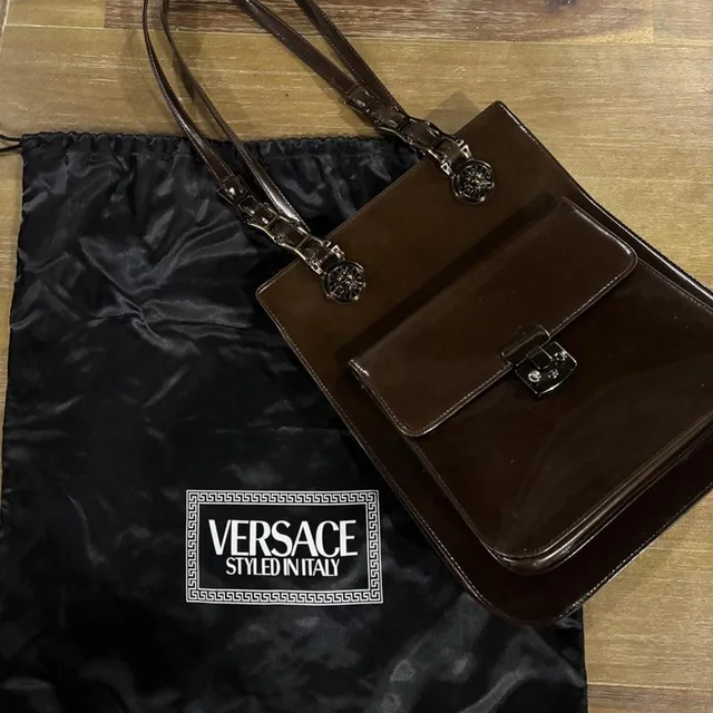 Versace Women's Clutch bags - Brown/Black in brown|black|red from Depop, photo 1 of 1