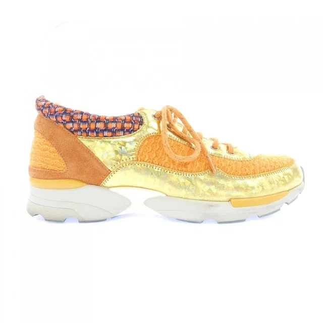 Chanel Sneakers Orange in Orange Calfskin from The Reluxe