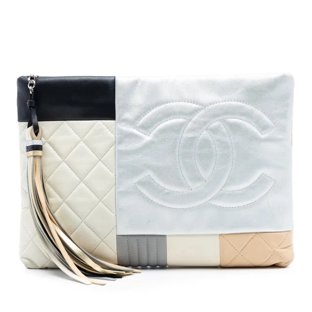 Silver Chanel Quilted Lambskin Colorblock Patchwork O Case Clutch in Silver Lambskin from Designer Revival