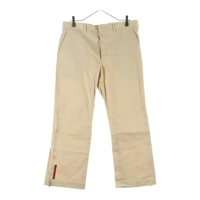 Prada Sport Rubber Logo Hem Zip Button Fly Flare Chino Pants Beige in Beige from The Reluxe