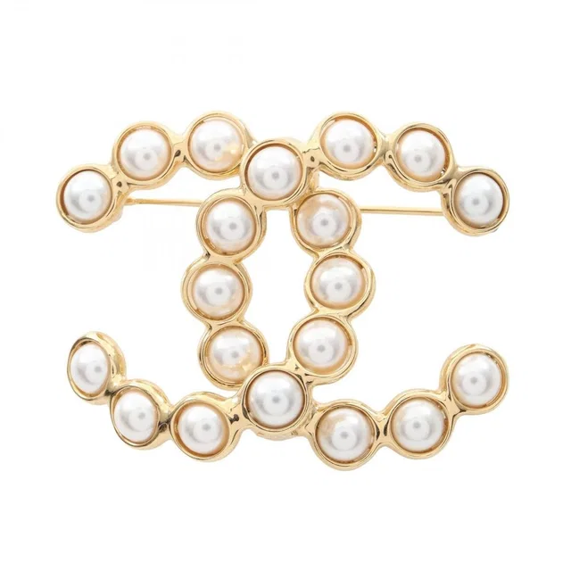 Chanel Brooch CC Logo from The Reluxe