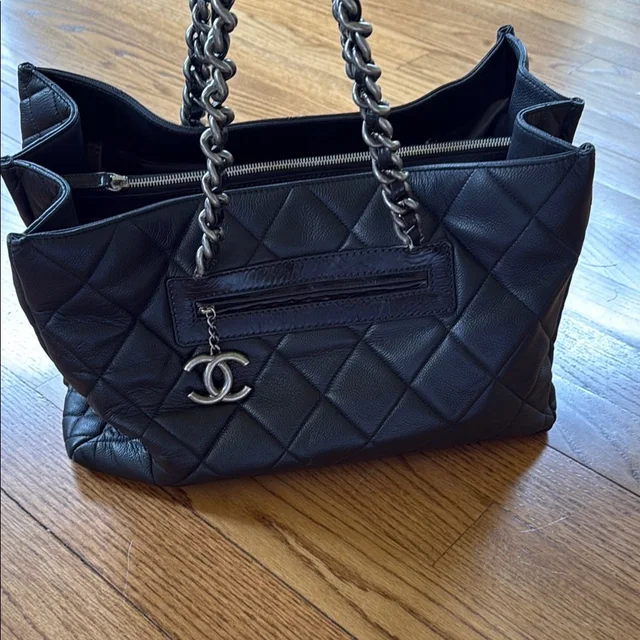 Chanel Quilted Leather Chain-Handle Shoulder Bag With Cc Charm in black Leather from Poshmark