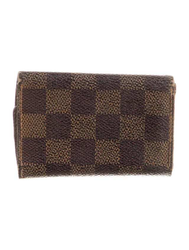 Louis Vuitton handbags, wallets & cases in Brown Coated canvas from The RealReal, photo 2 of 3