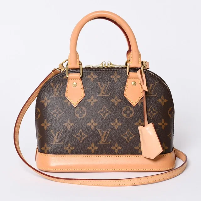 Louis Vuitton Monogram Alma BB Handbag Shoulder Gold in Gold Leather from The Reluxe