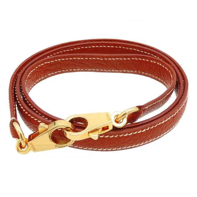 Hermès Brick Gold Chevre Kelly Shoulder Strap in Gold Goatskin from The Reluxe