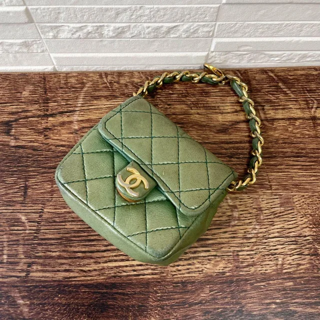 Chanel Mini Quilted Lambskin CC Logo Pouch Charm in Lambskin from The Reluxe