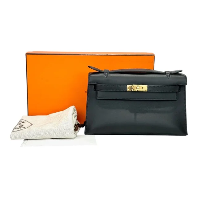 Hermès Kelly Pochette Black in Swift Leather Bag in Black Swift leather from Luxury Promise