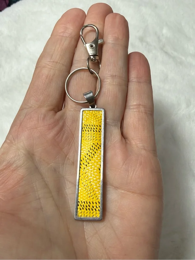 Goyard Repurposed Material Key Fob Clip in yellow from Poshmark