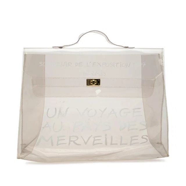 White Hermès Vinyl Souvenir De L Exposition Kelly Handbag in White from Designer Revival