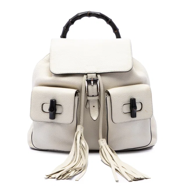 White Gucci Grained Calfskin Bamboo Tassel Backpack in White Caviar leather from Designer Revival