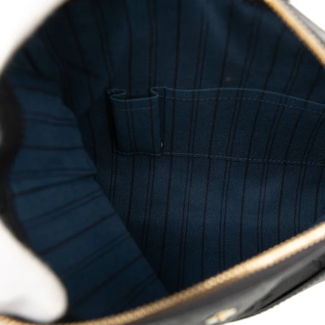 Blue Louis Vuitton Monogram Empreinte Petillante Clutch Bag in Blue Leather from Designer Revival, photo 2 of 2