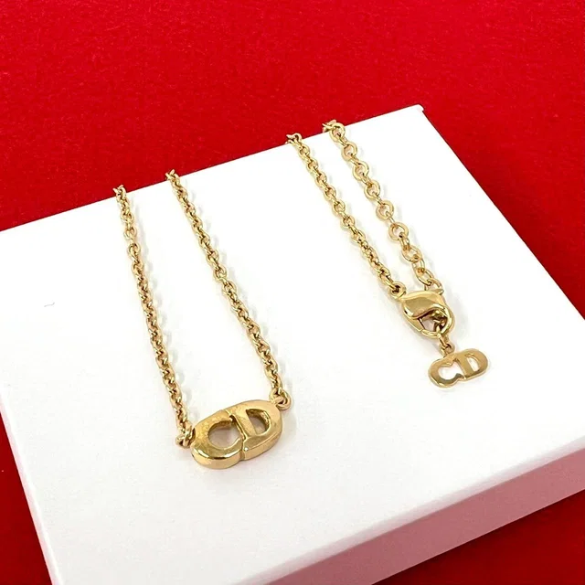 Dior CD Logo Motif Pendant Gold in Gold from The Reluxe