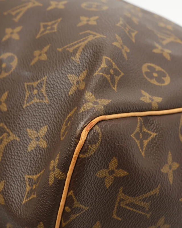 Louis Vuitton Monogram Keepall 60 Weekend Bag in Coated canvas from A Retro Tale, photo 6 of 10