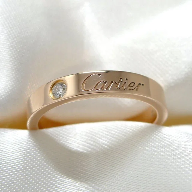 Cartier Engraved Wedding Ring Pink Gold in Pink from The Reluxe