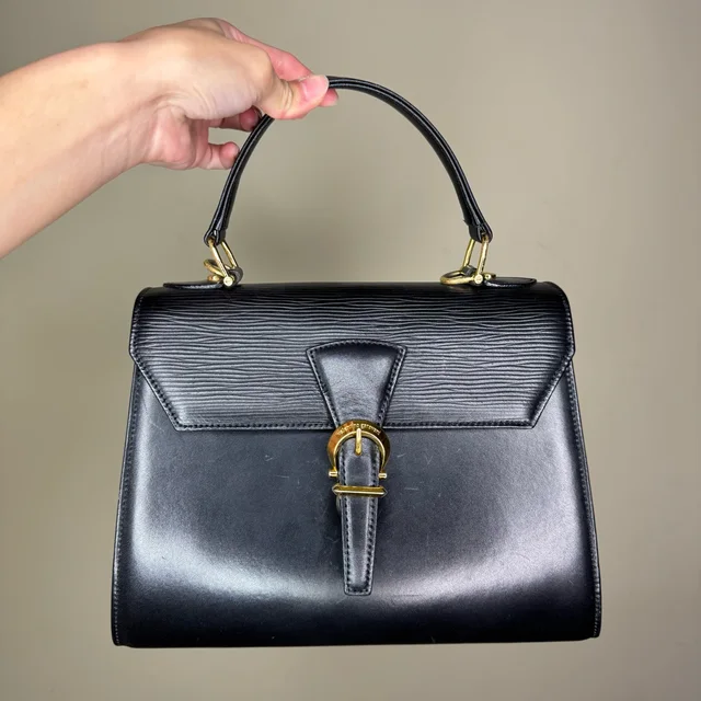 Valentino Garavani handbags in black from Poshmark, photo 1 of 1