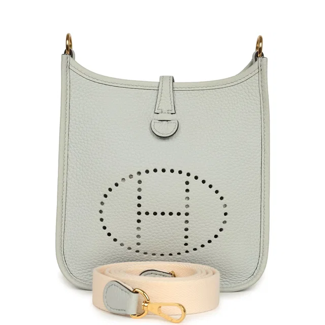 Hermès Evelyne TPM Bleu Pale Clemence Gold Hardware in Blue Clemence leather from Madison Avenue Couture