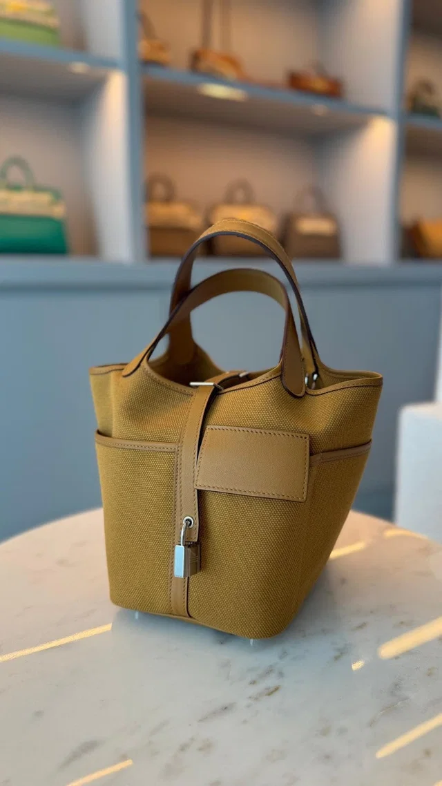 Hermès Picotin 18 Sesame Canvas and Swift in Swift leather from Luxury Promise